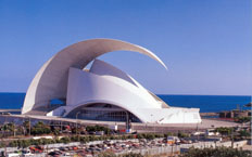Aerial view of the Tenerife opera house and auditorium, with the sea in the background