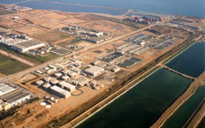 Aerial view of the treatment plant showing small water reservoirs under treatment